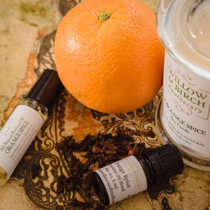 Orange Spice scented natural artisan bath, beauty, and fragrance products by Willow & Birch Apothecary pictured with fresh orange and clove buds, inspired by Downton Abbey and English garden style, vintage victorian style for the old soul