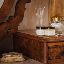 Willow and Birch Apothecary’s Rose Petals Day Cream and Sweet Dreams Night Cream displayed on antique furniture, highlighting their popular wrinkle cream and best moisturizer for dry skin.