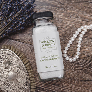 Experience the soothing epsom salt benefits with Lavender Breeze bath salts by Willow & Birch, displayed with fresh lavender and elegant pearls. These natural bath salts offer a tranquil spa salt bath experience, perfect for relaxing after a long day.