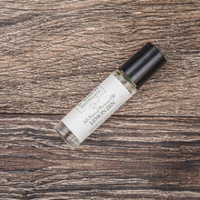 Willow and Birch Apothecary's Lemon Zen perfume oil against a rustic backdrop, capturing the essence of natural perfume and plant based perfumes and fragrance oils.