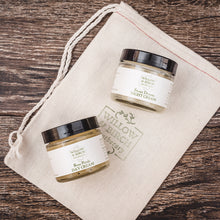 A selection of the best face moisturizer for dry face, with anti aging products benefits, displayed on top of a cloth bag, by Willow & Birch Apothecary.