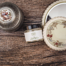 Vintage vanity featuring Willow & Birch Apothecary’s Sweet Dreams Night Cream, a recommended face moisturizer for its natural face moisturizers and a good cream for wrinkles, alongside antique decor.