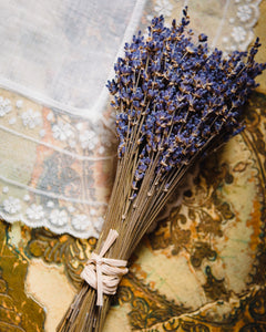 Lavender bouquet on lace linens