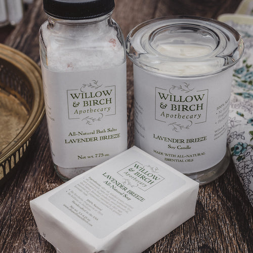 Spa day gift set with natural scented candle, mineral bath salts, and scented soap by Willow & Birch Apothecary with gold vanity tray and antique handkerchief