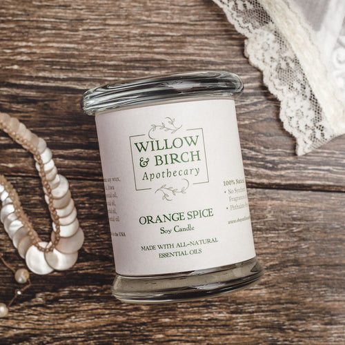 Orange Spice natural scented soy candle made with essential oils from Willow & Birch Apothecary with Victorian antique lace and antique pearl jewelry